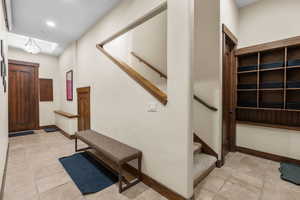 Hallway with area for skis and storage