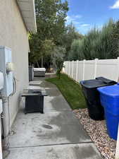 Fenced backyard with a patio