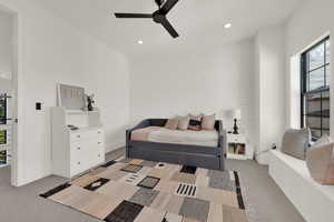 Bedroom featuring light carpet, recessed lighting, and a ceiling fan