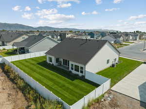 Aerial view of residential area with a mountain backdrop