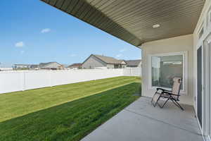 View of yard featuring a patio area and a residential view