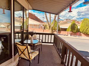 Balcony featuring a residential view