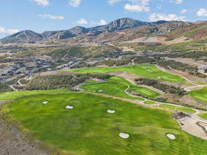 View of mountain backdrop featuring a golf course