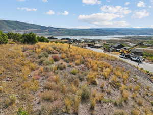 View of mountain background featuring a nearby body of water