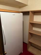storage room with freezer
