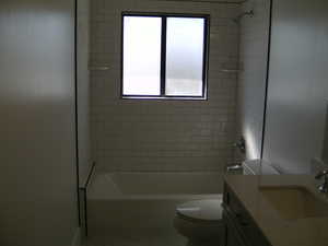 Full bath with  shower combination and vanity