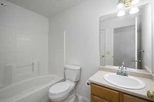 Full bathroom with vanity and tub / shower combination