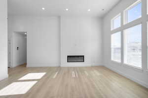 FIREPLACE!  CEILINGS AR 12' TALL!(PICTURE OF PREVIOUS BUILT HOME-OPTIONS, COLORS AND MATERIALS MAY VARY)