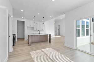 DINING AREA SET OFF FROM KITCHEN W/ LOTS OF WINDOWS! (PICTURE OF PREVIOUS BUILT HOME-OPTIONS, COLORS AND MATERIALS MAY VARY)