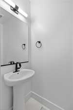 1/2 BATH OF MUDROOM & GARAGE! (PICTURE OF PREVIOUS BUILT HOME-OPTIONS, COLORS AND MATERIALS MAY VARY)