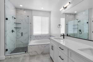 PRIMARY SUITE BATHROOM W/ TILED SEPERATE TUB/SHOWER! (PICTURE OF PREVIOUS BUILT HOME-OPTIONS, COLORS AND MATERIALS MAY VARY)