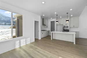 OVERSIZED STAINED ISLAND BAR W/ PENDANT LIGHTS! (PICTURE OF PREVIOUS BUILT HOME-OPTIONS, COLORS AND MATERIALS MAY VARY)