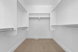 VERY LARGE PRIMARY SUITE CLOSET!  (PICTURE OF PREVIOUS BUILT HOME-COLORS AND MATERIALS MAY VARY)