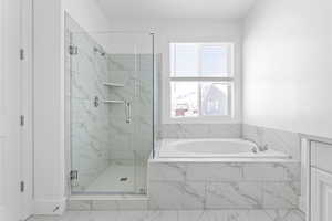 PRIMARY SUITE BATHROOM W/ SEPERATE TUB/SHOWER!  (PICTURE OF PREVIOUS BUILT HOME-COLORS AND MATERIALS MAY VARY)