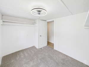 Unfurnished bedroom featuring carpet