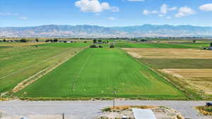 Overview of rural landscape with mountains and abundant farmland