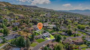 Aerial view of property's location with mountains, nearby suburban area, and property boundaries highlighted