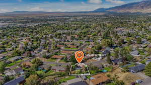 Aerial view of property's location featuring property boundaries highlighted and nearby suburban area