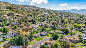 Aerial view of residential area with mountains