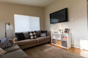 Living room featuring wood finished floors