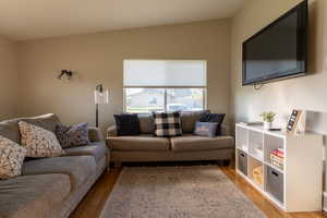 Living room with wood finished floors