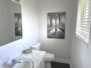Bathroom with toilet and vanity