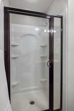 3/4 bath featuring a stall shower