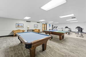 Playroom with pool table and baseboards
