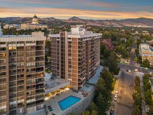 Property at dusk featuring a mountain view