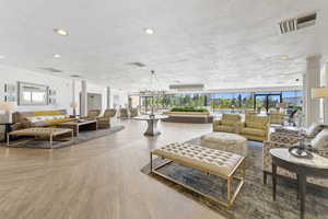 Lobby featuring a textured ceiling and recessed lighting
