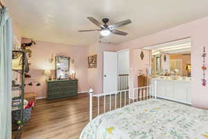 Bedroom featuring wood finished floors and ceiling fan