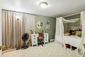 Bedroom with light wood finished floors