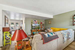 Living area with wood finished floors and french doors
