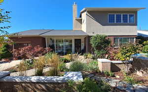 Front view facing east with views of