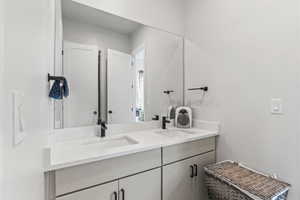 Bathroom featuring double vanity