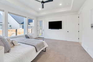 Primary bedroom with access to the covered back patio