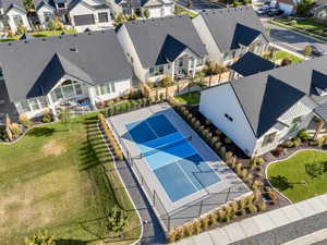 View of pickle ball court next to the home