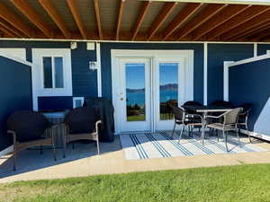 View of patio / terrace with a grill and outdoor dining area