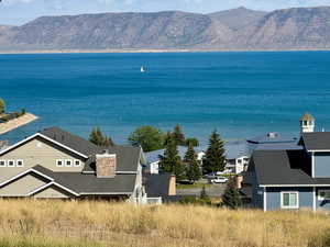 Water view with mountains and nearby suburban area