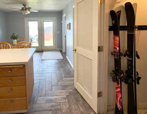 Entryway featuring baseboards and a ceiling fan