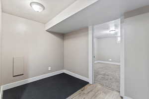 Living area in the basement. Also makes a great gaming nook or office.