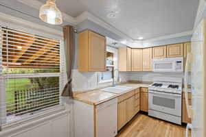 Kitchen on main level of home which also has room for a small dining tableKitchen on main level of home which also has room for a small dining table