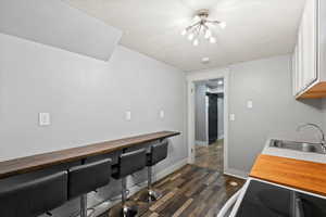 Basement kitchen with bar and barstoolsBasement kitchen with bar and barstools