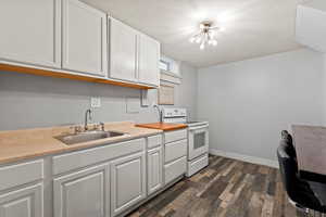 Basement kitchen with bar and barstools