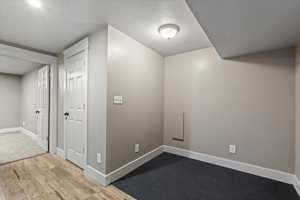 Living area in the basement. Also makes a great gaming nook or office.