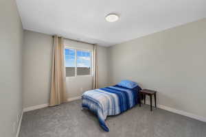 Bedroom 3 featuring carpet flooring