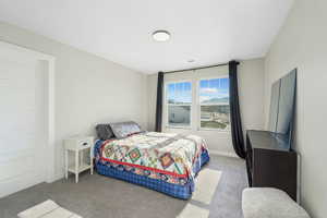 Bedroom 1 featuring carpet flooring