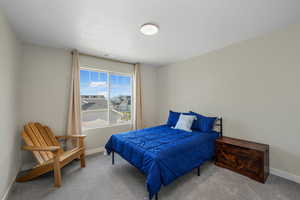 Bedroom 2 featuring carpet flooring