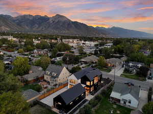 Aerial view at dusk of a residential view and a mountain view