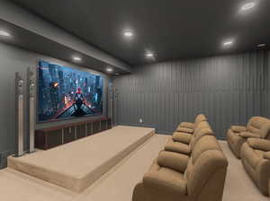 Carpeted home theater with recessed lighting